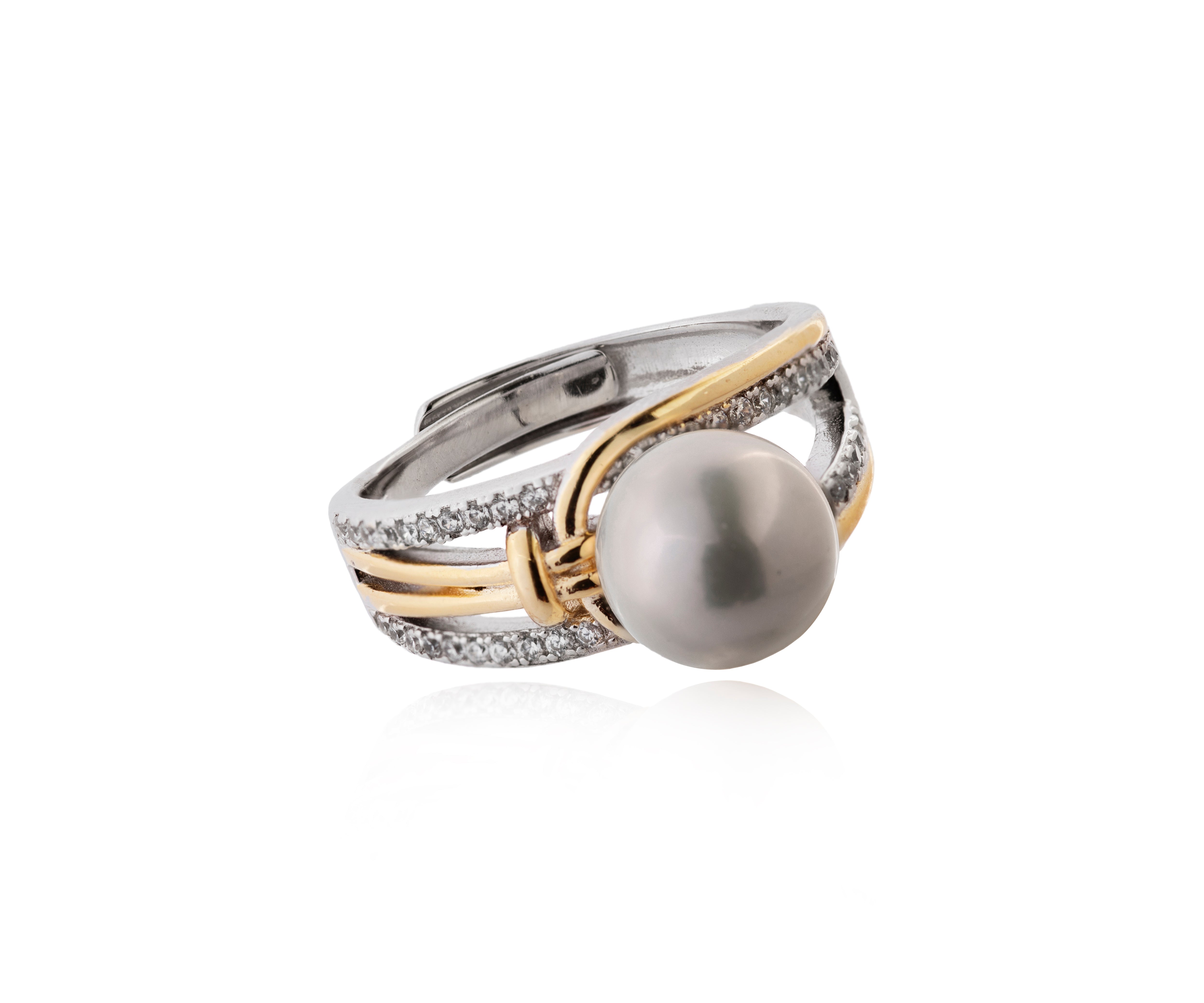 Anillo bicolor con circonitas y perla cultivada.